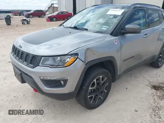 2020 Jeep Compass Trailhawk z VIN 3C4NJDDB5LT171727, wystawiony jako IAAI lot #41844523 z przebiegiem 103 952 mil mil oraz . Historia ofert i sprzedaży dostępna na DreamBid. Obrazek 6.