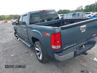 2007 GMC Sierra 1500 SLE1 z VIN 2GTEC13J971571282, wystawiony jako IAAI lot #41980128 z przebiegiem 221 024 mil mil oraz . Historia ofert i sprzedaży dostępna na DreamBid. Obrazek 3.