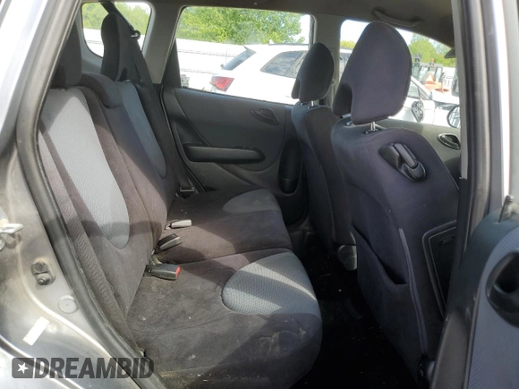 2007 Honda Fit z VIN JHMGD37427S059531, wystawiony jako Copart lot #57025775 z przebiegiem 224 576 mil mil oraz Czysty tytuł • Clean title. Historia ofert i sprzedaży dostępna na DreamBid. Obrazek 10.