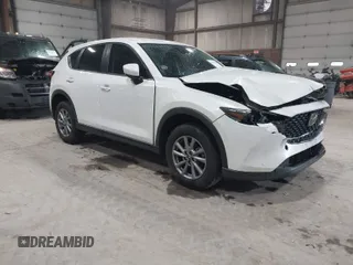 2023 Mazda CX-5 2.5 S with VIN JM3KFBAMXP0153362, listed as a IAAI auction lot 41875188 with 57,648 mi miles. Bid and sale history available at carsss.com. Image 1.