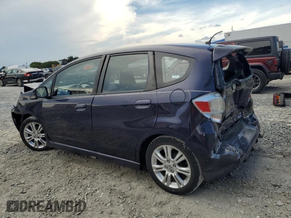 2009 Honda Fit Sport z VIN JHMGE88409S052668, wystawiony jako Copart lot #56142275 z przebiegiem 118 445 mil mil oraz Szkoda całkowita • Salvage title. Historia ofert i sprzedaży dostępna na DreamBid. Obrazek 2.