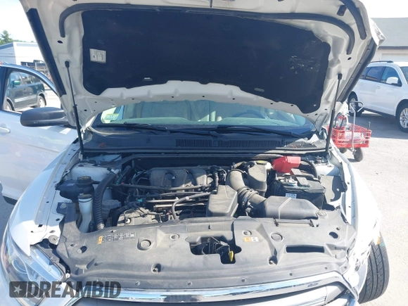 2014 Ford Taurus SE с VIN 1FAHP2D89EG128381, выставлен на аукционе IAAI как лот 42379885 с пробегом 34 937 миль миль и . История ставок и продаж доступна на DreamBid. Изображение 10.