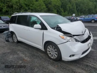 2015 Toyota Sienna LE with VIN 5TDJK3DCXFS126604, listed as a Copart auction lot 56987355 with 102,079 mi miles and Salvage title. Bid and sale history available at DreamBid. Image 4.