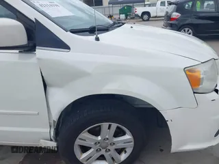 2011 Dodge Grand Caravan Crew with VIN 2D4RN5DGXBR786592, listed as a IAAI auction lot 42114198 with 243,423 mi miles and . Bid and sale history available at DreamBid. Image 6.