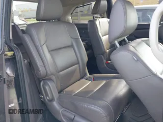 2014 Honda Odyssey Touring with VIN 5FNRL5H99EB111685, listed as a IAAI auction lot 42141227 with 183,484 mi miles and . Bid and sale history available at DreamBid. Image 8.