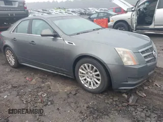 2011 Cadillac CTS z VIN 1G6DA5EY8B0155508, wystawiony jako IAAI lot #41548497 z przebiegiem 341 955 mil mil oraz . Historia ofert i sprzedaży dostępna na DreamBid. Obrazek 1.