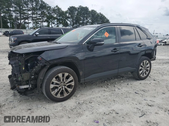 2021 Toyota RAV4 XLE Premium with VIN 2T3C1RFV9MW162776, listed as a Copart auction lot 55336675 with 79,060 mi miles and Salvage title. Bid and sale history available at DreamBid. Image 1.