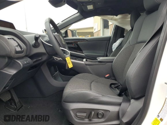 2024 Toyota bZ4X XLE with VIN JTMABACA2RA087660, listed as a Copart auction lot 61295995 with 2,288 mi miles and Salvage title. Bid and sale history available at DreamBid. Image 7.