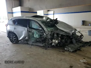 2018 Mazda CX-5 Grand Touring with VIN JM3KFADM4J0349097, listed as a Copart auction lot 59912875 with Not provided miles and Non repairable. Bid and sale history available at DreamBid. Image 4.