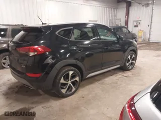 2017 Hyundai Tucson Sport with VIN KM8J3CA24HU446388, listed as a IAAI auction lot 41734586 with 104,771 mi miles. Bid and sale history available at carsss.com. Image 4.