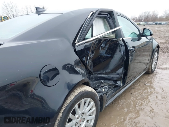 2012 Cadillac CTS with VIN 1G6DC5E54C0146550, listed as a IAAI auction lot 41735872 with 119,784 mi miles and . Bid and sale history available at DreamBid. Image 6.