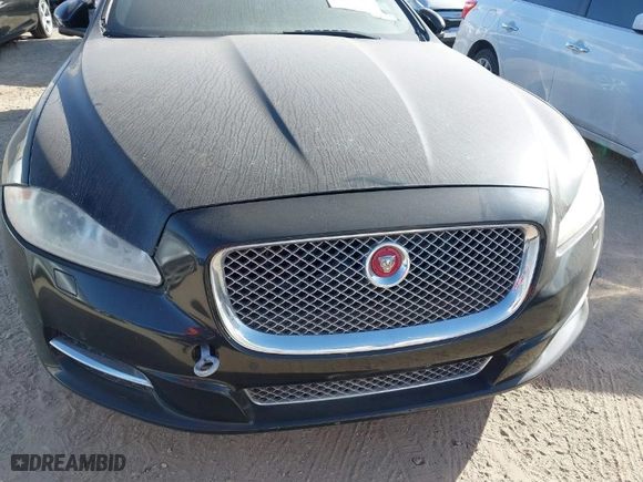 2015 Jaguar XJ with VIN SAJWA1CZ1F8V90549, listed as a IAAI auction lot 41817327 with NaN miles. Bid and sale history available at carsss.com. Image 12.