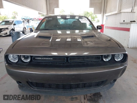 2018 Dodge Challenger SXT z VIN 2C3CDZAG5JH339596, wystawiony jako IAAI lot #42343718 z przebiegiem 62 113 mil mil oraz . Historia ofert i sprzedaży dostępna na DreamBid. Obrazek 13.