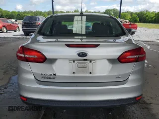 2018 Ford Focus SE z VIN 1FADP3F25JL265168, wystawiony jako Copart lot #56541895 z przebiegiem Nie podano mil oraz Szkoda całkowita • Salvage title. Historia ofert i sprzedaży dostępna na DreamBid. Obrazek 6.