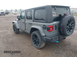 2023 Jeep Wrangler Sahara with VIN 1C4JJXP6XPW698886, listed as a IAAI auction lot 42439690 with 41,787 mi miles and . Bid and sale history available at DreamBid. Image 3.