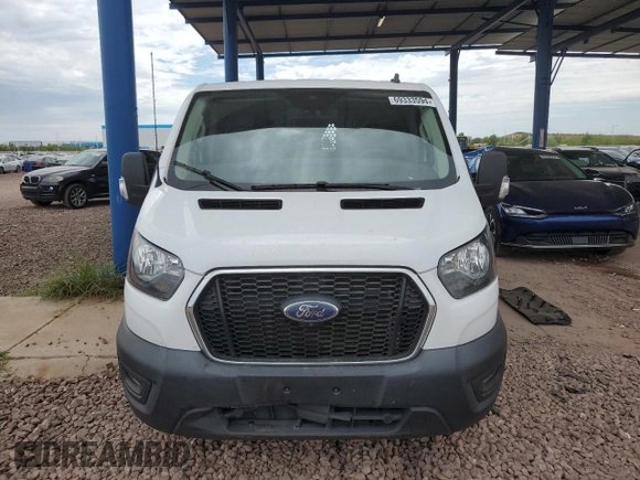 2021 Ford Transit Cargo with VIN 1FTYE1Y86MKB00604, listed as a Copart auction lot 69333594 with 60,464 mi miles and Salvage Title. Bid and sale history available at carsss.com. Image 5.