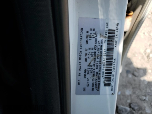 2012 Mazda 3 i Grand Touring with VIN JM1BL1W86C1612267, listed as a Copart auction lot 66250175 with 168,494 mi miles and Clean title. Bid and sale history available at DreamBid. Image 12.