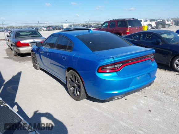 2015 Dodge Charger SXT with VIN 2C3CDXHG1FH866598, listed as a IAAI auction lot 41944761 with 201,163 mi miles and . Bid and sale history available at DreamBid. Image 3.
