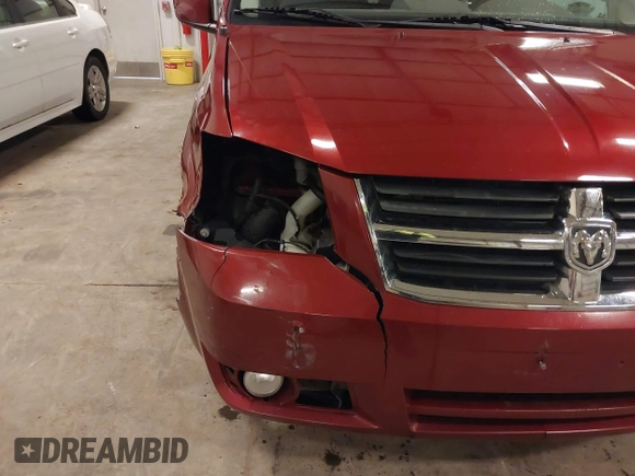 2010 Dodge Grand Caravan Crew with VIN 2D4RN6DX8AR403138, listed as a IAAI auction lot 41937966 with 137,060 mi miles and . Bid and sale history available at DreamBid. Image 6.