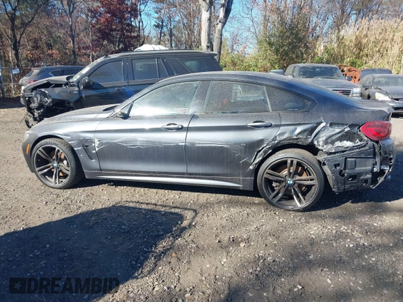 2019 BMW 4 Series 440i xDrive with VIN WBA4J7C52KBM75345, listed as a IAAI auction lot 40613703 with 31,402 mi miles and . Bid and sale history available at carsss.com. Image 14.