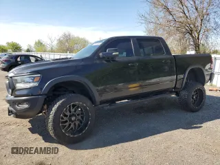 2020 Ram 1500 Rebel z VIN 1C6SRFLT0LN244883, wystawiony jako Copart lot #55631665 z przebiegiem 119 120 mil mil oraz Czysty tytuł • Clean title. Historia ofert i sprzedaży dostępna na DreamBid. Obrazek 1.