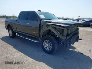 2021 Ram 2500 Laramie with VIN 3C6UR5FLXMG630400, listed as a IAAI auction lot 41903223 with 89,584 mi miles and . Bid and sale history available at DreamBid. Image 1.