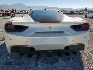 2018 Ferrari 488 z VIN ZFF79ALA5J0232045, wystawiony jako Copart lot #69417283 z przebiegiem 26 053 mil mil oraz . Historia ofert i sprzedaży dostępna na DreamBid. Obrazek 6.