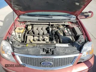 2005 Ford Five Hundred SE with VIN 1FAFP23115G159622, listed as a Copart auction lot 70700344 with 159,788 mi miles and Salvage Title. Bid and sale history available at carsss.com. Image 11.