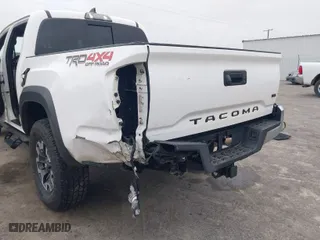 2019 Toyota Tacoma 4WD SR with VIN 5TFCZ5ANXKX204955, listed as a IAAI auction lot 41694378 with 108,410 mi miles. Bid and sale history available at carsss.com. Image 6.