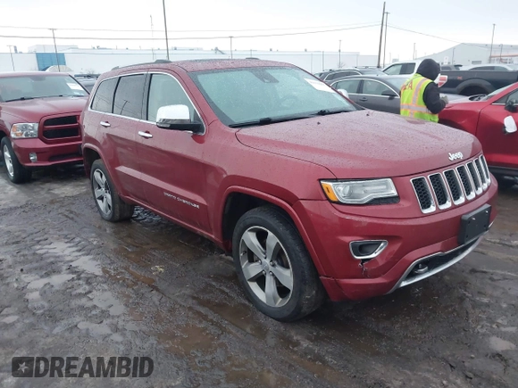 2014 Jeep Grand Cherokee Overland with VIN 1C4RJFCG9EC299235, listed as a IAAI auction lot 41670065 with 108,589 mi miles and . Bid and sale history available at DreamBid. Image 1.