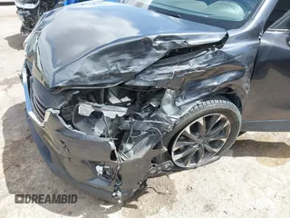 2016 Mazda CX-5 Grand Touring with VIN JM3KE4DY7G0643643, listed as a IAAI auction lot 42077497 with 120,343 mi miles and . Bid and sale history available at carsss.com. Image 6.