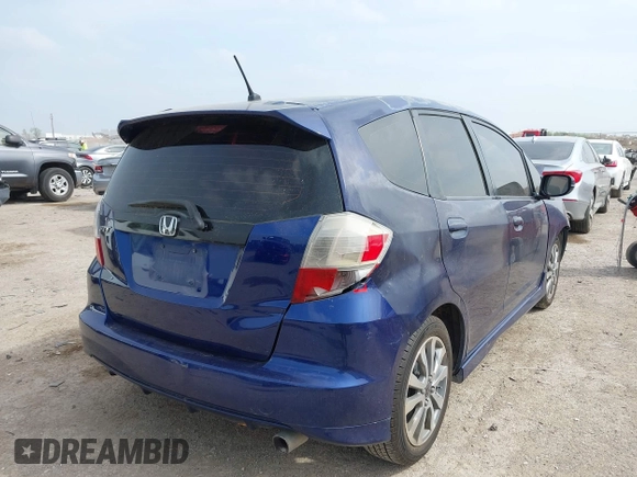 2013 Honda Fit Sport with VIN JHMGE8H54DC027896, listed as a IAAI auction lot 41933061 with 137,696 mi miles. Bid and sale history available at carsss.com. Image 4.