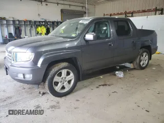 2014 Honda Ridgeline RTL with VIN 5FPYK1F59EB010077, listed as a Copart auction lot 86980934 with 206,228 mi miles and Salvage Title. Bid and sale history available at carsss.com. Image 1.