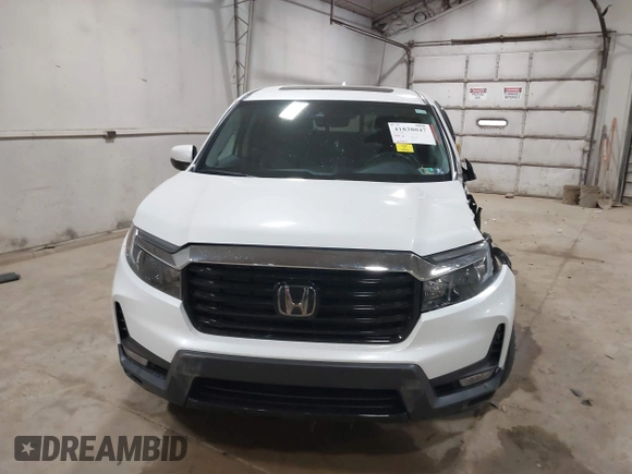 2022 Honda Ridgeline RTL-E z VIN 5FPYK3F76NB033832, wystawiony jako IAAI lot #41838047 z przebiegiem 16 497 mil mil oraz . Historia ofert i sprzedaży dostępna na DreamBid. Obrazek 13.