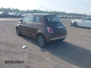 2012 FIAT 500 Lounge z VIN 3C3CFFCR5CT106416, wystawiony jako IAAI lot #42115342 z przebiegiem 147 742 mil mil oraz . Historia ofert i sprzedaży dostępna na DreamBid. Obrazek 3.