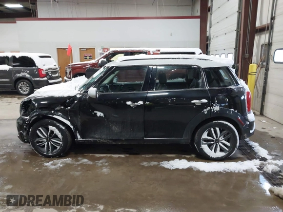 2014 MINI Countryman S with VIN WMWZC5C57EWP39161, listed as a IAAI auction lot 41342912 with 108,459 mi miles and . Bid and sale history available at DreamBid. Image 14.