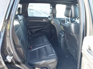 2014 Jeep Grand Cherokee Overland with VIN 1C4RJFCT5EC221015, listed as a IAAI auction lot 41959844 with 78,367 mi miles and . Bid and sale history available at DreamBid. Image 8.