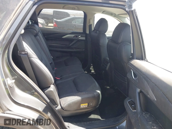 2021 Mazda CX-9 Touring with VIN JM3TCACY2M0502016, listed as a IAAI auction lot 41825456 with 86,068 mi miles. Bid and sale history available at carsss.com. Image 8.