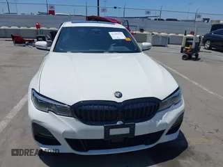 2019 BMW 3 Series 330i with VIN WBA5R1C55KAJ98934, listed as a IAAI auction lot 42396379 with 65,946 mi miles and . Bid and sale history available at DreamBid. Image 12.