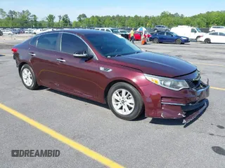 2018 Kia Optima LX with VIN 5XXGT4L30JG250681, listed as a IAAI auction lot 42075577 with 142,357 mi miles. Bid and sale history available at carsss.com. Image 1.