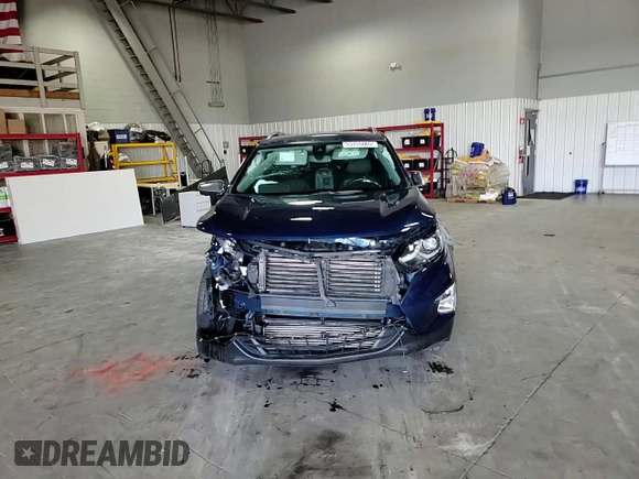 2020 Chevrolet Equinox Premier z VIN 2GNAXXEV0L6273682, wystawiony jako Copart lot #55155065 z przebiegiem 71 754 mil mil oraz Szkoda całkowita • Salvage title. Historia ofert i sprzedaży dostępna na DreamBid. Obrazek 14.