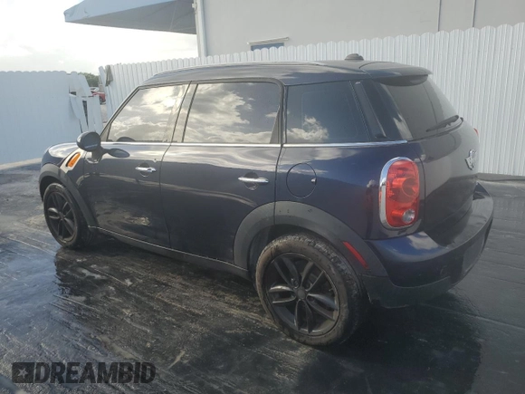 2013 MINI Countryman with VIN WMWZB3C59DWM08636, listed as a Copart auction lot 77442344 with 103,118 mi miles and Clean title. Bid and sale history available at DreamBid. Image 2.