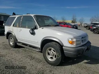 1999 Ford Explorer Sport with VIN 1FMYU24X7XUC50909, listed as a Copart auction lot 50254305 with 83,605 mi miles and Salvage title. Bid and sale history available at DreamBid. Image 12.