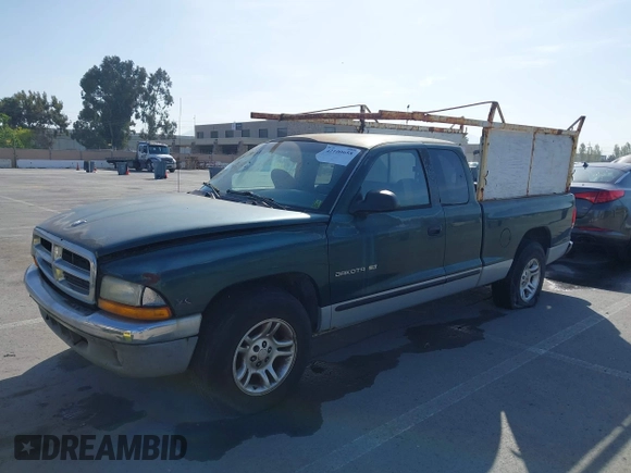 2000 Dodge Dakota with VIN 1B7GL22X2YS648337, listed as a IAAI auction lot 42100658 with 180,790 mi miles. Bid and sale history available at carsss.com. Image 6.