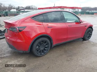 2023 Tesla Model Y Long Range with VIN 7SAYGDEE1PA169031, listed as a IAAI auction lot 41660766 with 35,253 mi miles and . Bid and sale history available at DreamBid. Image 4.