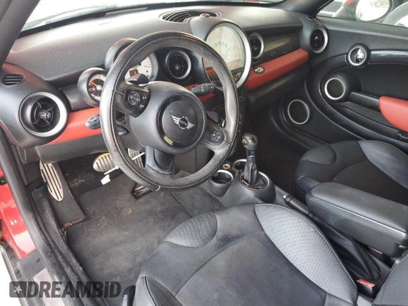 2013 MINI Roadster S z VIN WMWSY3C56DT593875, wystawiony jako Copart lot #74982124 z przebiegiem 64 622 mil mil oraz Szkody całkowita. Historia ofert i sprzedaży dostępna na DreamBid. Obrazek 8.