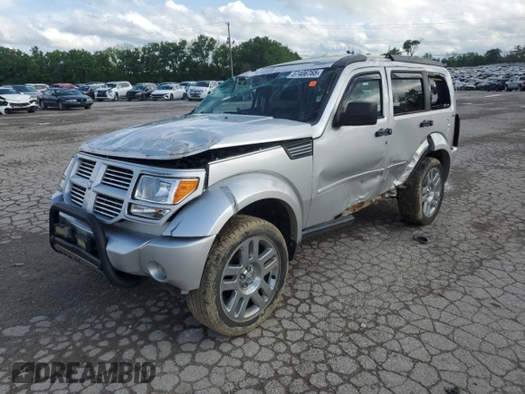 2010 Dodge Nitro Heat with VIN 1D4PU4GK2AW170976, listed as a Copart auction lot 57406765 with 213,121 mi miles and Salvage title. Bid and sale history available at DreamBid. Image 1.