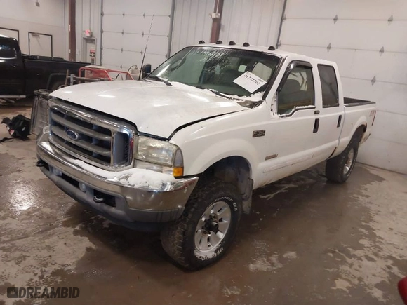 2003 Ford Super Duty F-350 SRW XL with VIN 1FTSW31P23EC17321, listed as a IAAI auction lot 41292702 with 114,178 mi miles. Bid and sale history available at carsss.com. Image 2.