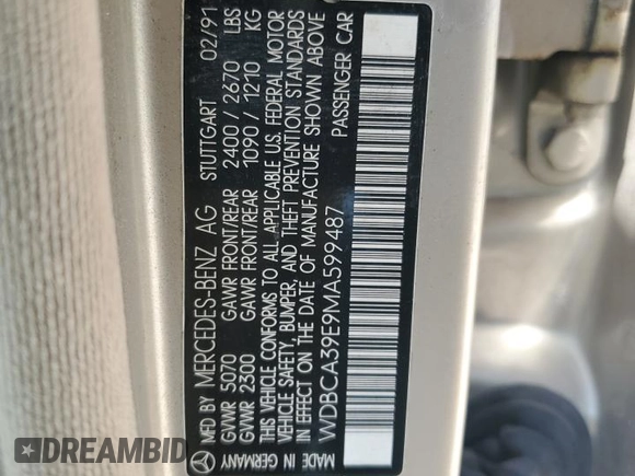 1991 Mercedes-Benz 560 with VIN WDBCA39E9MA599487, listed as a Copart auction lot 51921915 with 59,132 mi miles and Salvage Title. Bid and sale history available at DreamBid. Image 12.