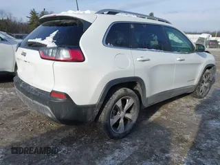 2020 Jeep Cherokee Limited with VIN 1C4PJLDB2LD535210, listed as a IAAI auction lot 41268119 with 119,918 mi miles. Bid and sale history available at carsss.com. Image 4.